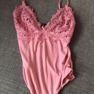 Pink body suit